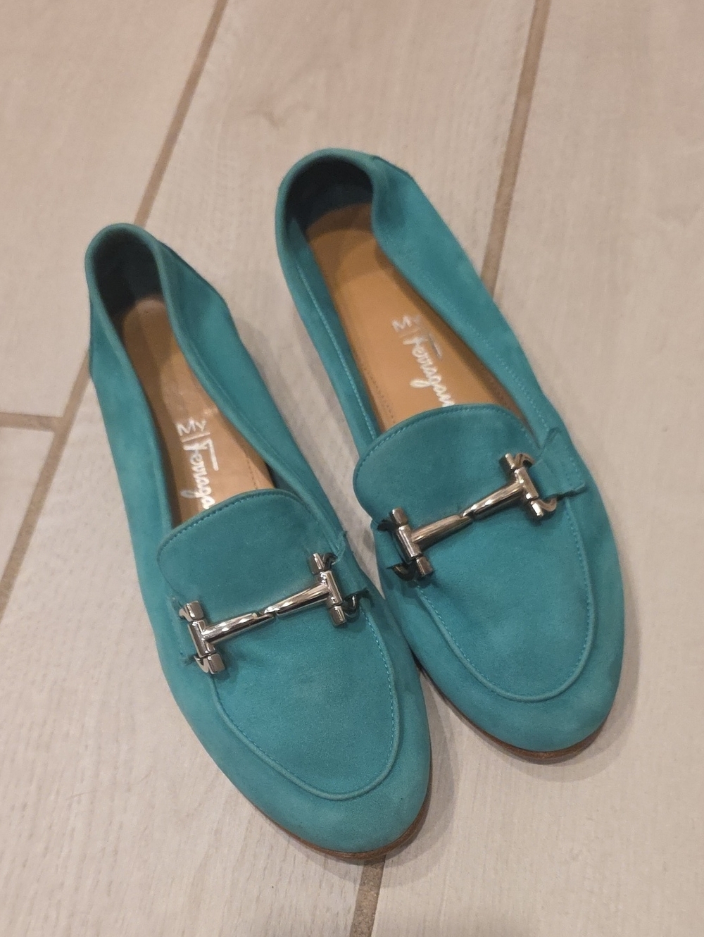 Salvatore Ferragamo turquoise suede bit loafers.